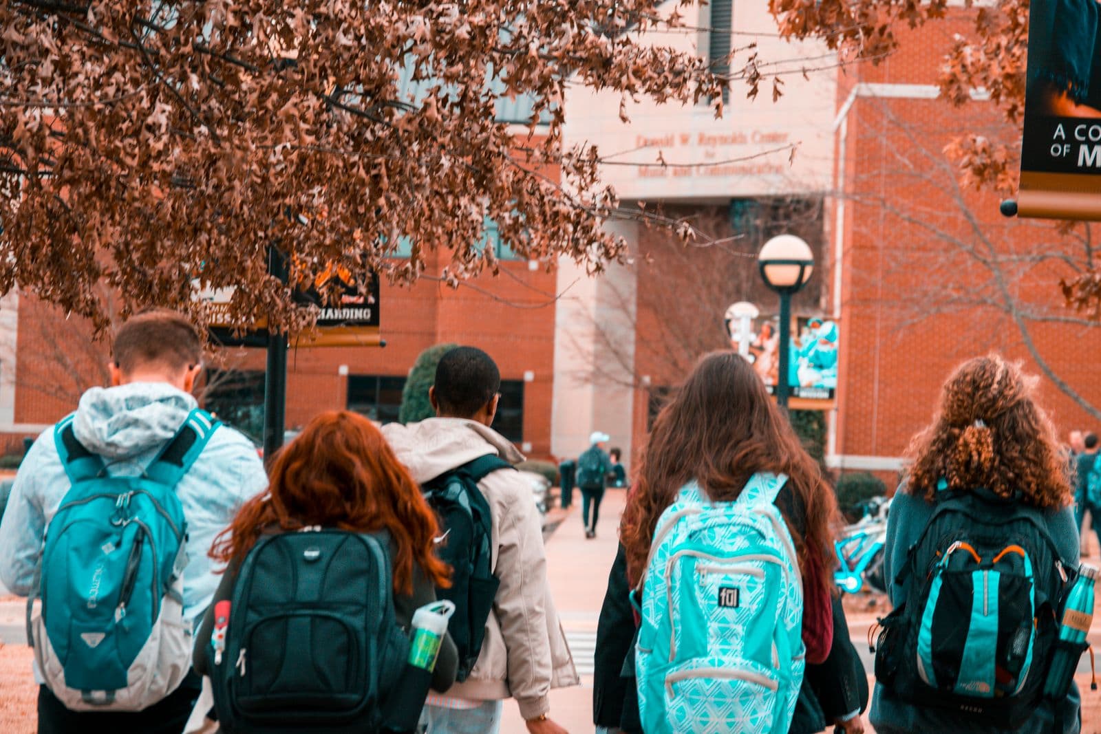 Students walking toward a campus building
