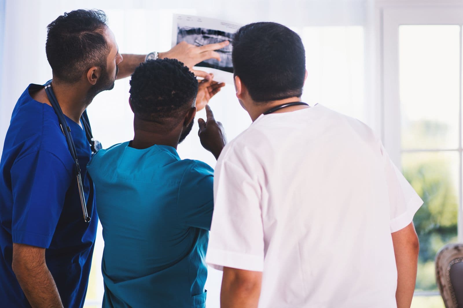 Healthcare professionals reviewing a medical image together